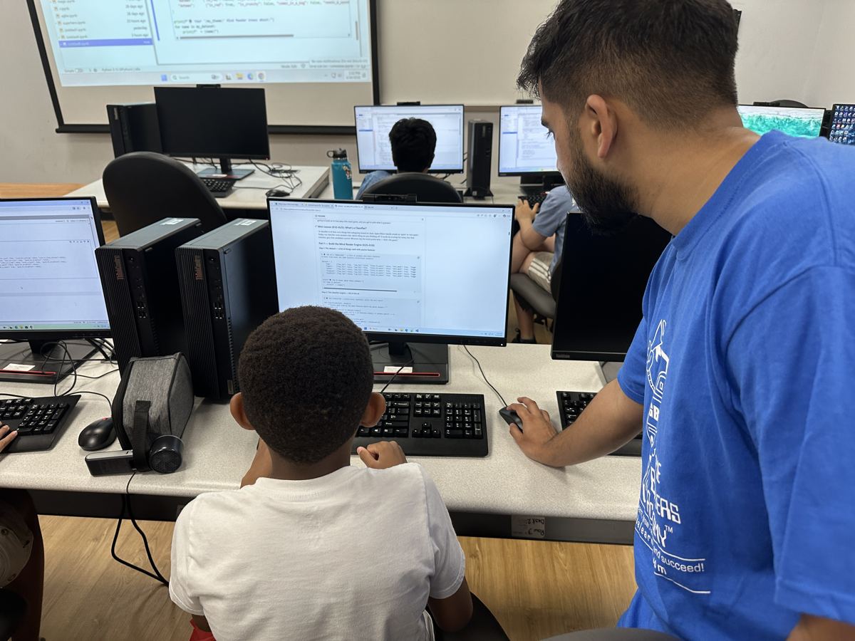 Nasif walking a student through a coding project on screen